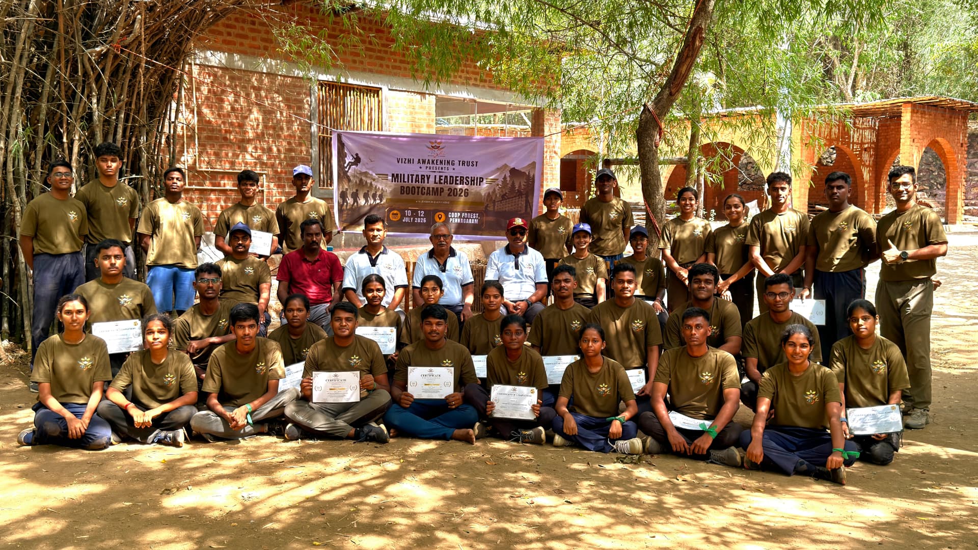 Vizhi Awakeners in uniform T-shirts standing together on a naval ship deck at the harbour